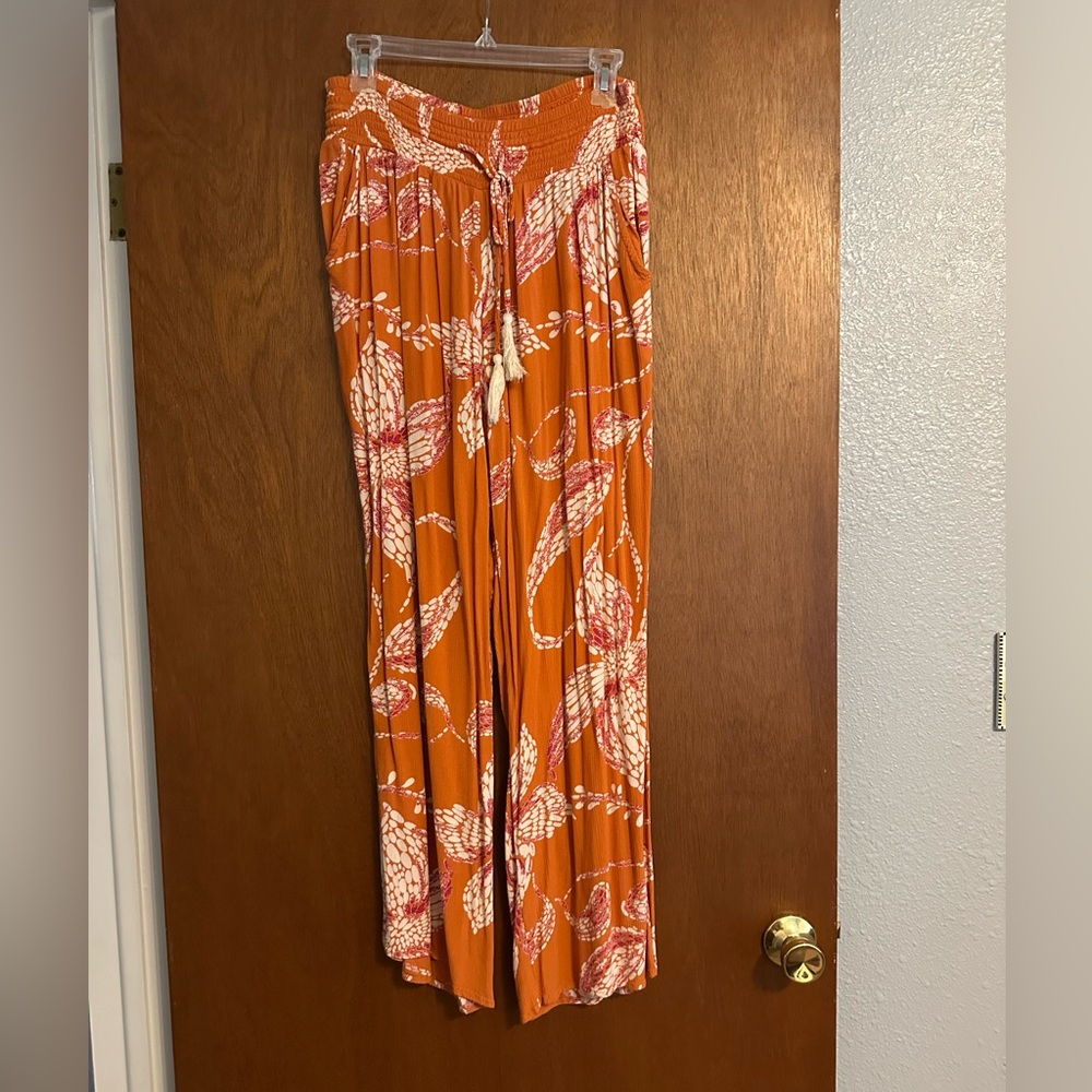 Maurices Orange and Cream Patterned Pants